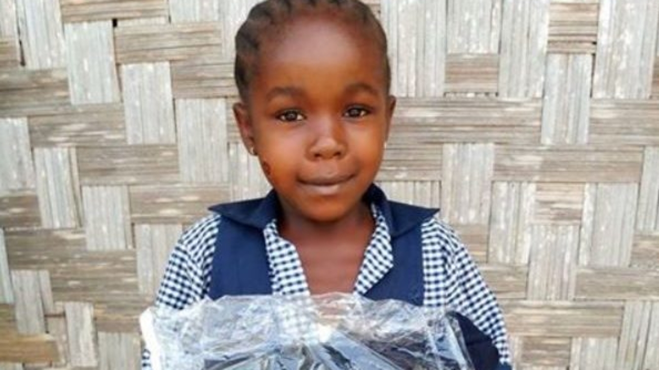 Liberia student w gift from sponsor